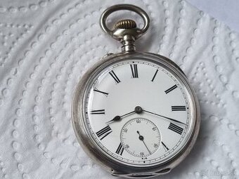 Strieborné, vreckové hodinky,Omega.