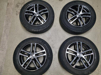 Dezent TZ dark 6x15 4x108 ET15 Michelin Energy Saver 185/65