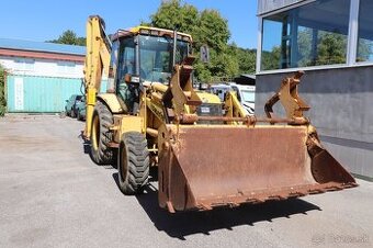 Báger KOMATSU WB97R