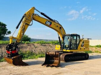 Pásový bager Caterpillar 323