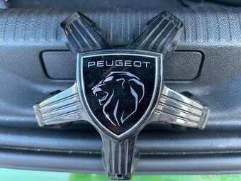 Stredove krytky Peugeot.