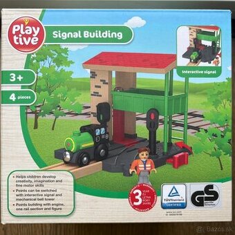 Búdka na prehadzovanie výhybiek a lokomotíva.