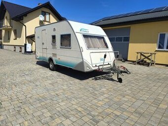 Knaus Eifelland 395 - 2001, predstan spolu so strieskou