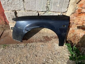 Audi A4 B6 ľavý predný blatník