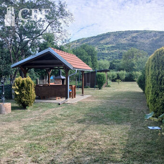 NA PREDAJ Zveľadená ZÁHRADKA s GARÁŽOU v Plešivci.