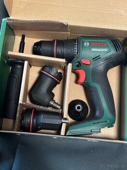 Vrtaci skrutkovač Bosch + nastavce - 1