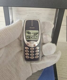 Strieborna minca- telefon Nokia 3310