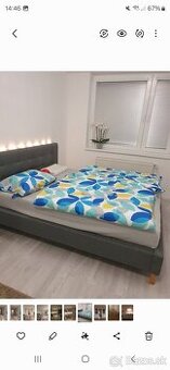 Čalúnená postel 160 cm s polohovatelnymi roštami