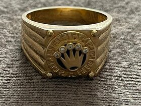 Zlaty prsten, motiv Rolex 555e