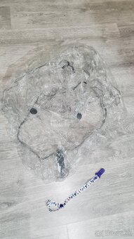 Predám stokke pršiplášť / pláštenku + pútko na cumlík/fľašu