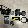 Nikon D3100 + 18-105 mm