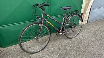 Zachovalý dámský bicykel