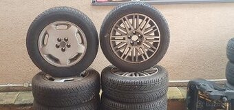 Dve sady diskov s pneu R16 R15 jazdené na Lanciu phedra.
