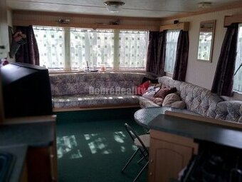 Parádny pozemok s mobilným domom na predaj - 1