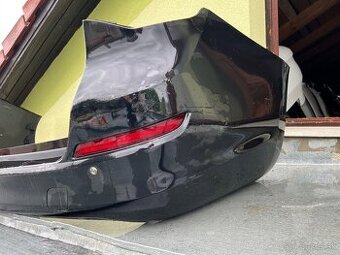 Opel astra J 4 kombi zadný naraznik - 1