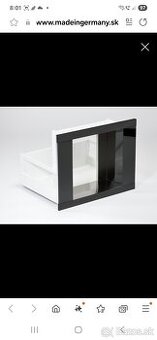 Vstavaná výsuvná schránka pre voľne stojace kávovary