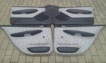 Tapacíry,rohož kufra,puklice a iné diely-Škoda Fabia1