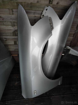 Pravý blatník Audi a6 c6 4f