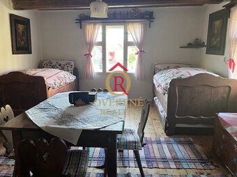 Útulná drevenička v tichej časti obce Komjatná