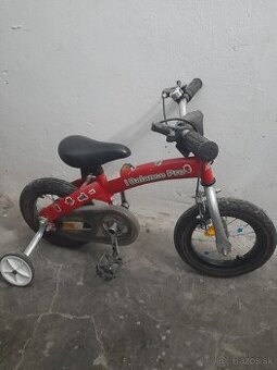 Detský bicykel s bočnými kolieskami
