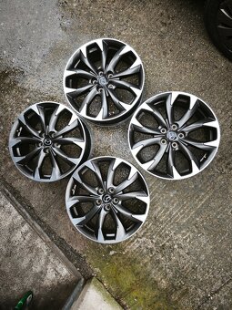 MAZDA R18/R19/ ORIG.ALU DISKY/