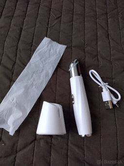 nielen cestovny masážny prístroj na očné okolie a pery.