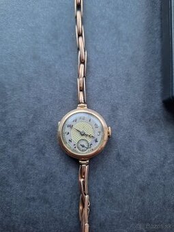 Zlaté dámske hodinky