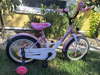 Ružový dievčenský bicykel s pomocnými kolieskami