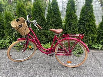 Cestný bicykel ružovej farby