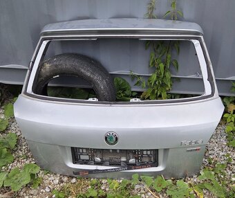 Škoda Fabia II kufrove dvere ľavý predný blatník