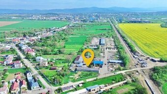 Byty, kancelárie, garáže a pozemok