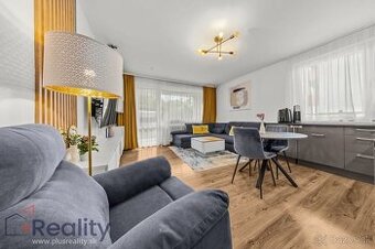 Moderne zariadený 2,5-izbový byt s vlastnou záhradkou v obci