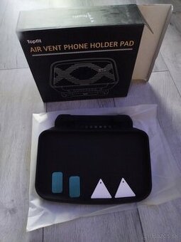 Držiak/ organizér na palubnú dosku Tesla