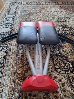 Posilňovací stroj na formovanie bokov (Hip abductor machine)