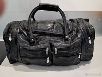 JD Williams cestovna kozena taska