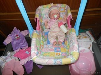 Nová bábika v nosiči a doplnky