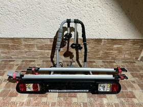 Nosic na bicykel na tazne