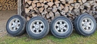 Disky s pneumatikami na Opel Frontera B - 2 sady
