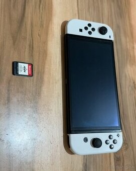 Predám Hernú konzolu Nintendo Switch Oled Bežné Známky