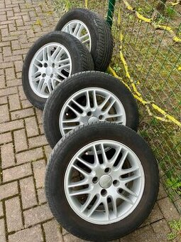 Letne pneumatiky Bridgestone s diskami Ford Focus II