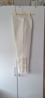 Damske 3/4 nohavice, s volanikmi a perlami, zn.River Island,