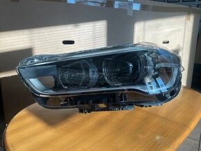 Ľ. predný svetlomet na BMW X1 (VALEO)