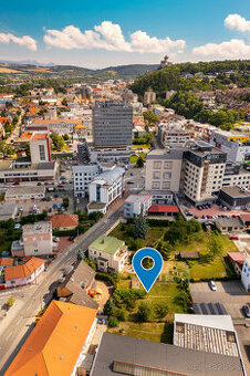 Na predaj rodinný dom s pozemkom a investičným potenciálom v