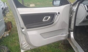 Skoda Roomster-Tapacire dveri