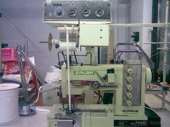 sijaci stroj  so zariadenim na nasivanie gumy