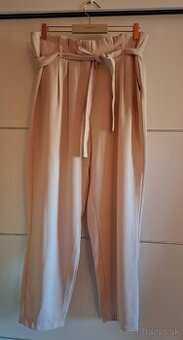 Dámske béžové elegantné nohavice