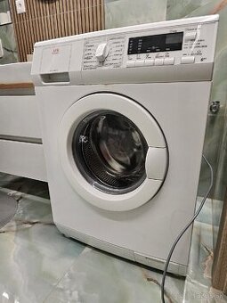 Set práčky a sušičky AEG – biela technika vo výbornom stave - 1