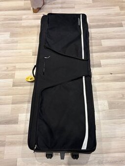 Pevný látkovy  kufor na kolieskach na klávesy