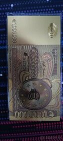 pozlatená reliéfna 1 000 0000€ bankovka