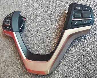 tlačítka a kryt volantu na BMW